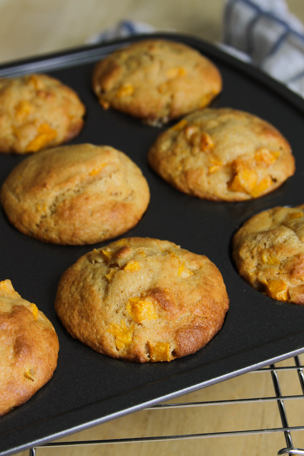 these whole wheat mango muffins are bursting with mango flavor and are very moist! simple to make and delicious!