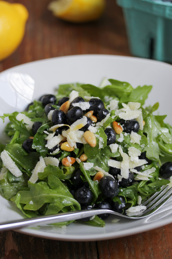 this blueberry arugula salad is quick to assemble and delicious - perfect for summer! add chicken for a meal or keep it as a vegetarian side.
