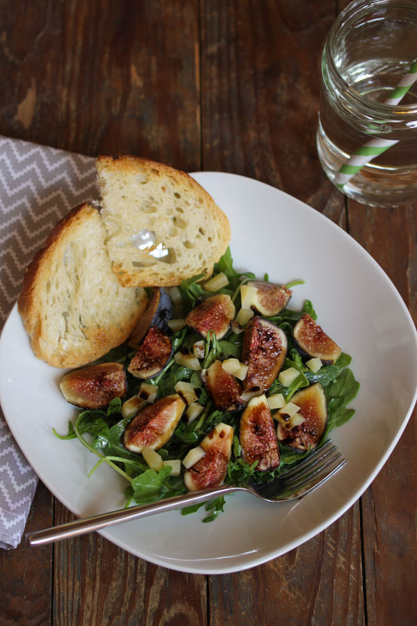this fig and cheese salad is quick to make and delicious, with only 5 ingredients: fresh figs, cheese, arugula, and a simple lemon/olive oil dressing.