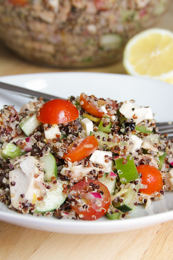 this protein-packed quinoa greek salad with chicken is delicious: fresh seasonal vegetables plus quinoa and chicken for protein to keep you feeling full!