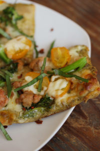 grilled pizza with pesto and broccolini