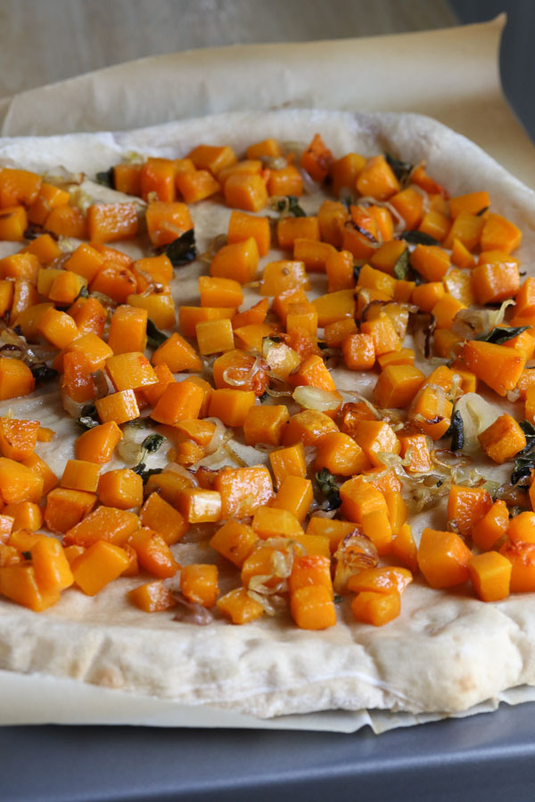 sage and goat cheese make this roasted butternut squash pizza extra delicious. it's great in fall and winter with a simple salad for dinner.