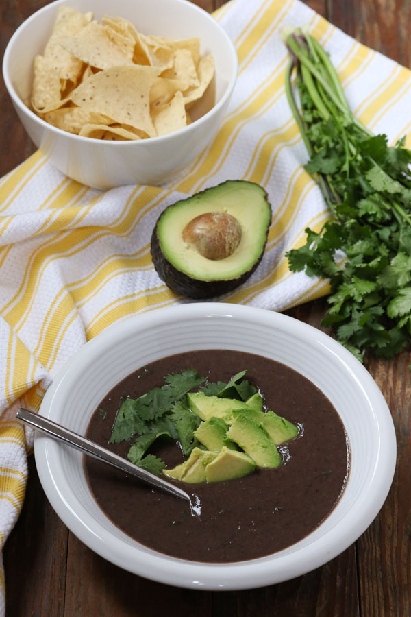 this spicy black bean soup is delicious, healthy, and ready in 30 minutes! it's also vegan, gluten free, dairy free, and vegetarian.