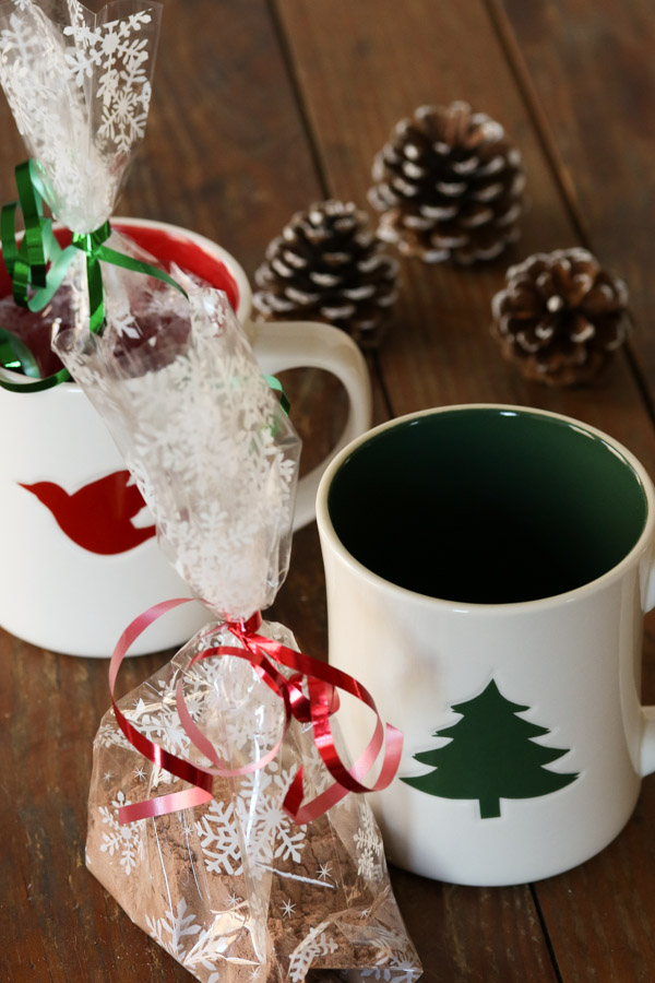 mug brownie mix packaged in festive holiday mugs and cellophane bags with ribbon