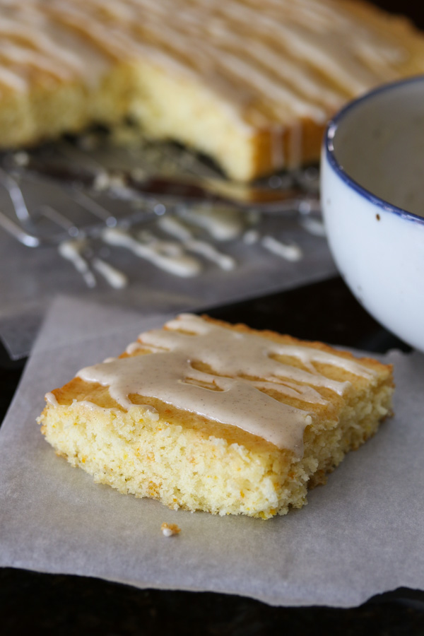 this olive oil orange cake with cardamom glaze is light, fluffy, and moist, with assertive but balanced orange and cardamom flavors.