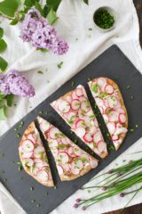 radish and whipped feta flatbread is the perfect appetizer or light dinner, combining crunchy radishes and creamy, tangy whipped feta. quick and easy.