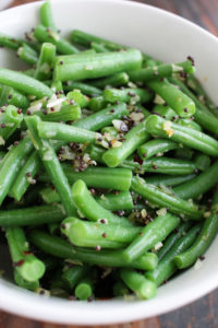 green beans with mustard seeds make a quick, delicious, and healthy vegetable side dish. crushed red pepper adds just a little bit of heat.