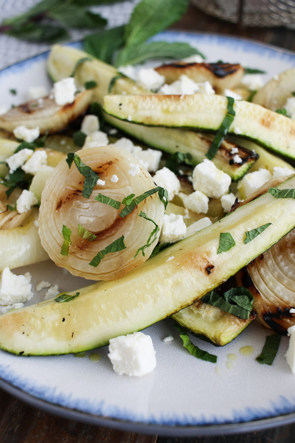 grilled zucchini and onions with mint and feta is a simple summer recipe, ready in about 10 minutes with just 5 ingredients.