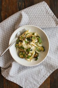 this end of summer vegetable pasta combines zucchini and corn with basil, fresh mozzarella, lemon, and olive oil for a simple dinner recipe.