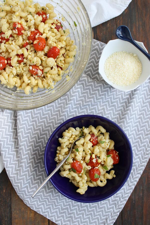this grilled corn and tomato pasta with basil tastes like summer in a bowl, is quick to put together, and won’t heat up your kitchen.
