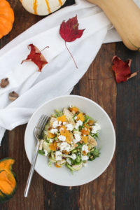 this roasted butternut squash salad is hearty, filling, and crunchy, thanks to chicken, goat cheese, and shredded brussels sprouts.