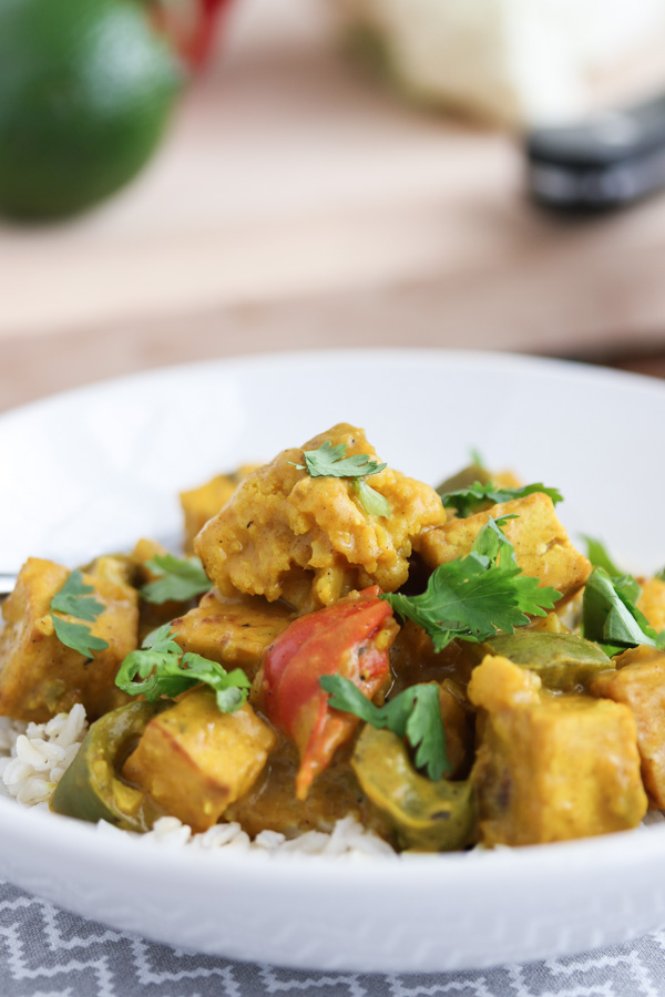 turmeric and coconut vegetable curry combines vegetables, tofu, spices, and coconut milk to make a delicious and easy vegetarian dinner.