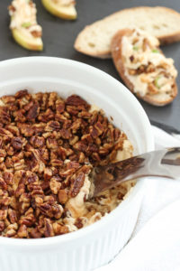baked cream cheese dip with glazed pecans is creamy and delicious, plus it freezes and reheats well. a great make-ahead appetizer for the holidays.
