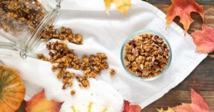 this pumpkin spice granola contains pumpkin puree as well as warming pumpkin spices for a cozy treat. easy to make a big batch and it stores well.