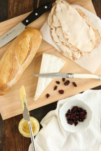 this turkey, brie, and cranberry sandwich has just 5 ingredients and is great with either leftover carved turkey or deli turkey. easy and delicious!