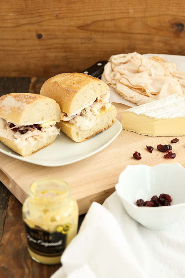 this turkey, brie, and cranberry sandwich has just 5 ingredients and is great with either leftover carved turkey or deli turkey. easy and delicious!