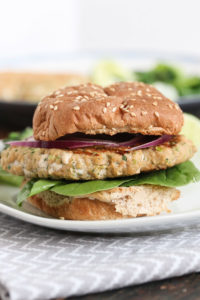 asian salmon burgers are healthy, fast, and delicious, thanks to sriracha, ginger, garlic, cilantro, and scallions. easy weeknight meal.