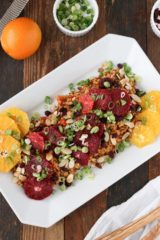 wintry citrus rice and quinoa salad combines bright and sunny oranges with flavorful rice to create a hearty but not heavy rice salad.