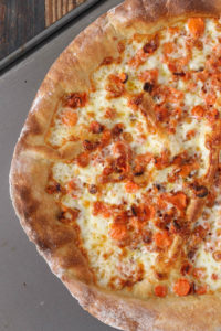 carrot pizza is a delicious addition to your vegetarian pizza repertoire! the carrots caramelize before getting added to the pizza with lots of garlic and mozzarella – so good!