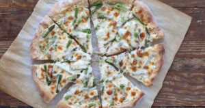 asparagus ricotta pizza is a delicious spring meal that comes together quickly from just a few simple ingredients. great vegetarian dinner!