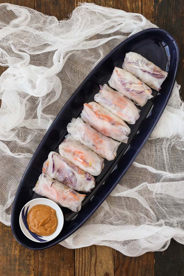 fresh vegetable spring rolls are easy to assemble, healthy, and customizable. includes information on where to find ingredients.