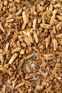 cardamom vanilla almond granola is easy to make from just a few ingredients. lower in sugar than many granolas, gluten free and vegan too.
