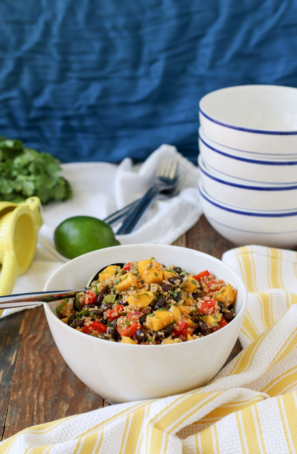 black bean and mango quinoa salad is fast, easy, and delicious – perfect for summer picnics and simple dinners! gluten free, vegan, dairy free.