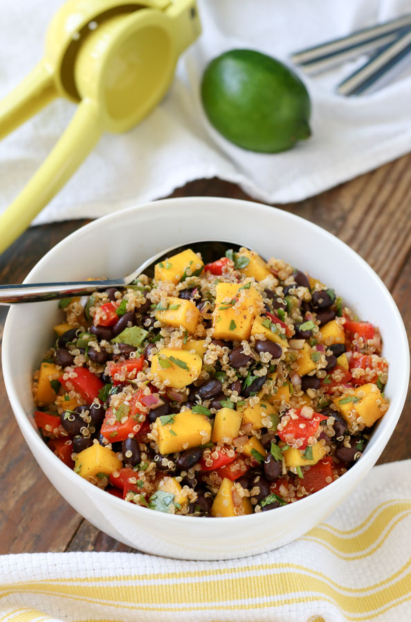 black bean and mango quinoa salad is fast, easy, and delicious – perfect for summer picnics and simple dinners! gluten free, vegan, dairy free.