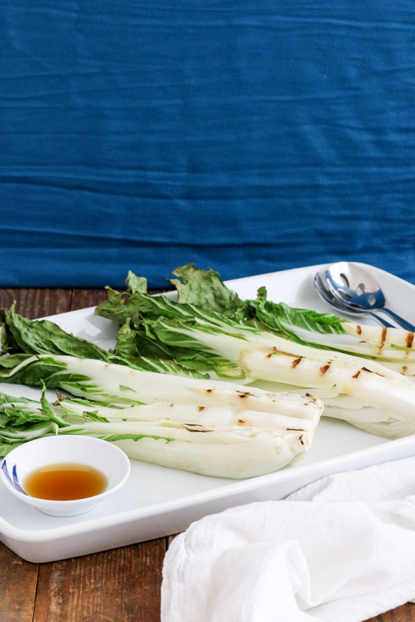 grilled bok choy with sesame oil is easy and makes a delicious vegetable side dish without heating up your kitchen. includes tips on setting up the grill.
