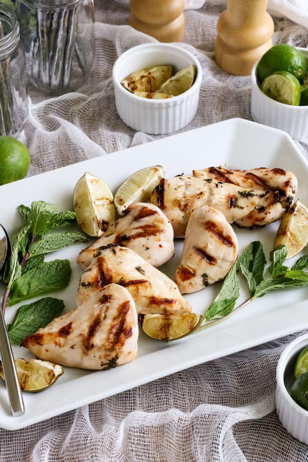 grilled mojito chicken turns your favorite refreshing summer drink into a chicken marinade, with mint, lime, and, of course, rum. easy, gluten free.