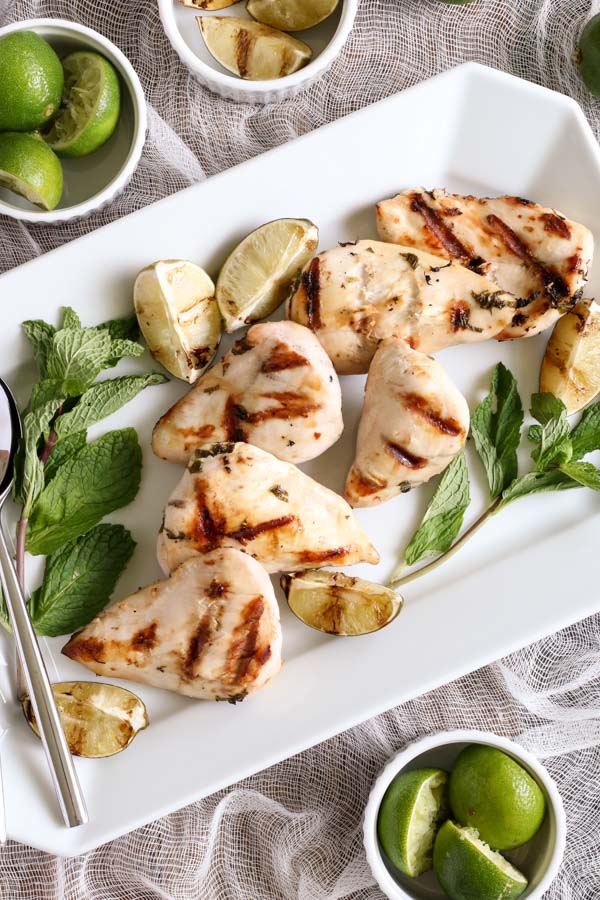 grilled mojito chicken turns your favorite refreshing summer drink into a chicken marinade, with mint, lime, and, of course, rum. easy, gluten free.
