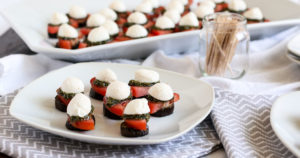 grilled eggplant caprese stacks are a perfect late summer appetizer with eggplant, tomatoes, fresh mozzarella, and basil pesto. delicious with pasta too.