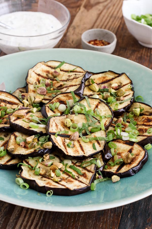 grilled eggplant with tzatziki, feta, and mint is easy to prepare and has delicious, bold mediterranean flavors. dairy free/vegan version.