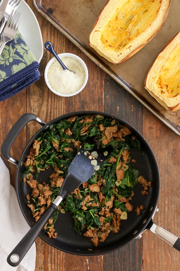 spaghetti squash bowls with sausage and spinach have a delicious savory flavor, are mostly hands-off, and are incidentally gluten and dairy free!