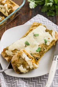 butternut squash and black bean enchiladas are a hearty vegetarian dinner that’s perfect for fall or winter. tomatillo salsa adds flavor and heat.