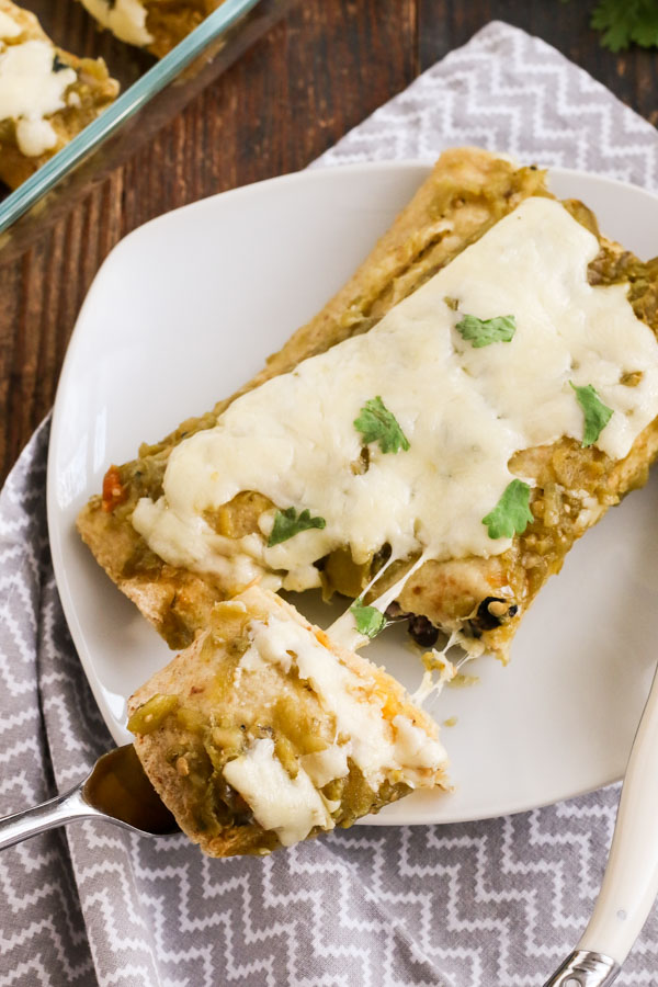 butternut squash and black bean enchiladas are a hearty vegetarian dinner that’s perfect for fall or winter. tomatillo salsa adds flavor and heat.