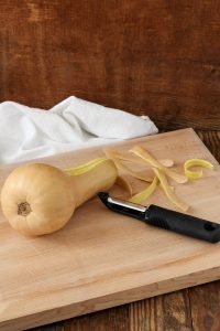 a quick tutorial on how to peel and cut butternut squash the easy way – without it slipping out of your hands or cutting yourself.