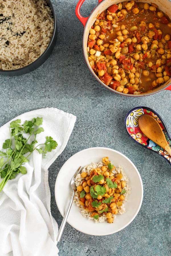 chana masala (chick peas with spices) is delicious, hearty, and ready in 50 minutes. gluten and dairy free, it’s great for feeding a crowd.