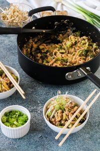 dan dan noodles are a savory one bowl dinner with pork, broccoli, and a flavorful peanut based sauce. perfect for meal prepping, gluten free, dairy free.