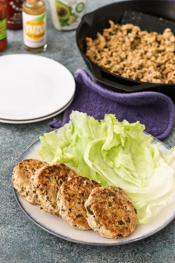 one batch of turkey creates 2 different meals: easy and spicy turkey burgers and taco filling. gluten/dairy free. quick to assemble or make ahead.