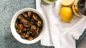 simple roasted brussels sprouts turn 4 simple ingredients into an amazing side dish that goes with everything. the sprouts turn tender on the inside and crispy on the outside. brussels sprouts, olive oil, and lemon are all you need - get this easy recipe now!
