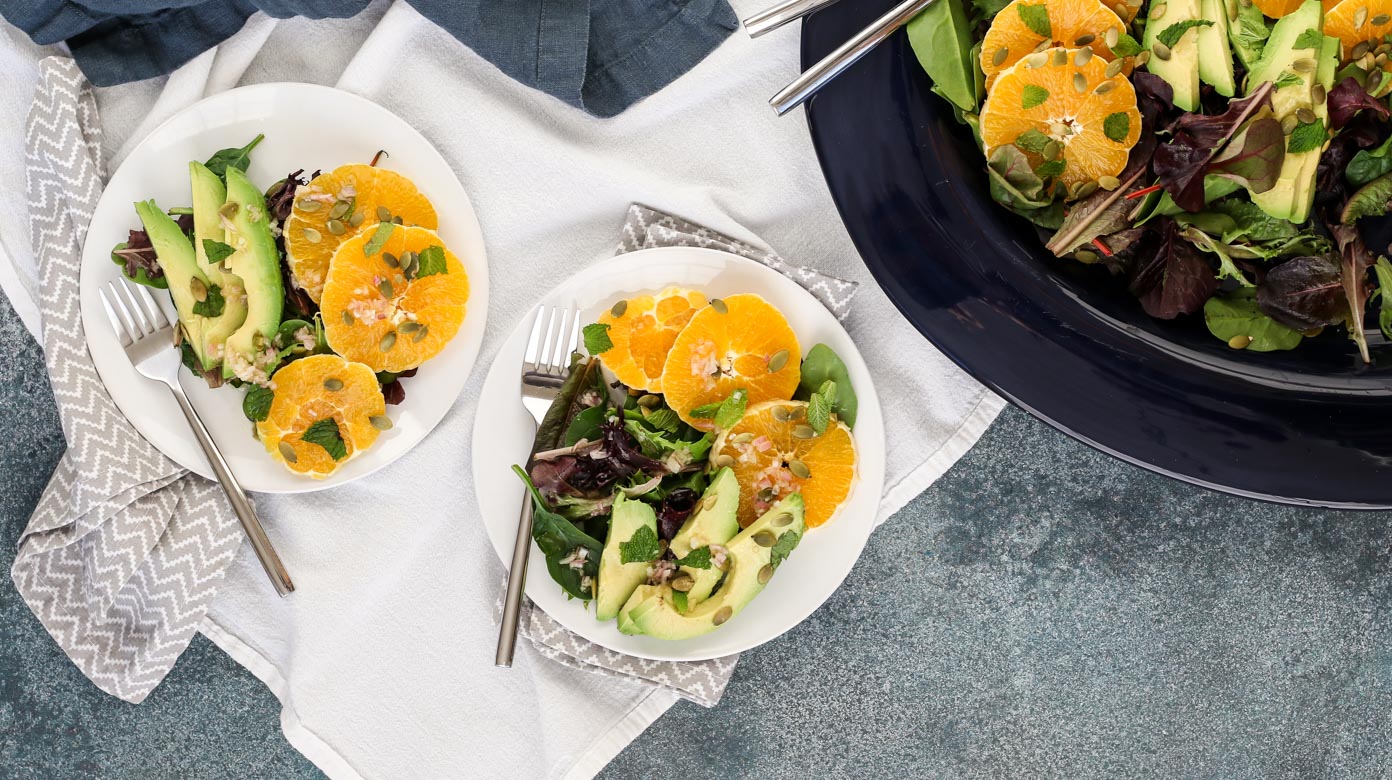 citrus avocado salad with jalapeño vinaigrette combines oranges and avocado in a refreshing winter salad. roasted jalapeño brightens up the vinaigrette and pepitas add crunch for contrast. get the recipe for this company-worthy salad today!