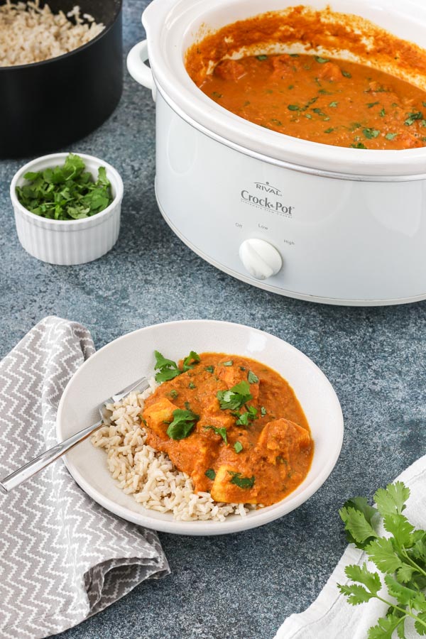 slow cooker chicken tikka masala - an indian restaurant takeout favorite - is easy to prepare, delicious, and comforting. no advance cooking necessary. gluten free, with a paleo/dairy free option. get the recipe today and enjoy an easy, protein-packed dinner!