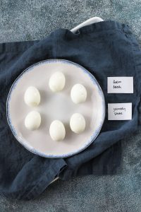 easy peel hard boiled eggs on a serving plate