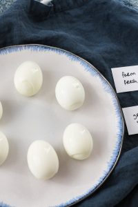 easy peel hard boiled eggs on a serving plate