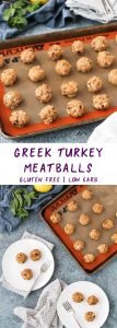 greek turkey meatballs on a white plate and a rimmed baking sheet