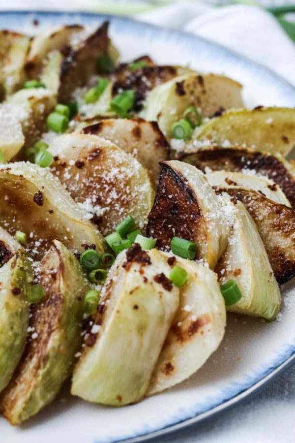 roasted kohlrabi with garlic, lemon, and pecorino is a simple and delicious way to turn your CSA vegetables into a tasty side dish.